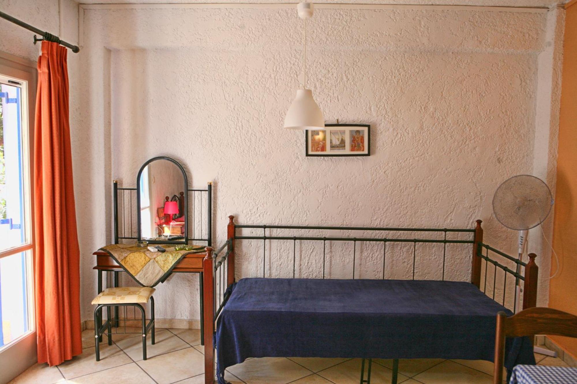 9 Musses Hotel Apartments Skala Mistegnon Habitación foto